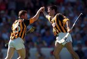 11 July 1999; Charlie Carter of Kilkenny celebrates after scoring his side's second goal with team-mate Ken O'Shea during the Leinster Senior Hurling Championship Final match between Kilkenny and Offaly at Croke Park in Dublin. Photo by Brendan Moran/Sportsfile