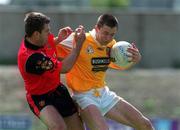 20 June 1999; Kevin Madde of Antrim in action against Paul Higgins of Down during the Bank of Ireland Ulster Senior Football Championship Quarter-Final match between Down and Antrim at Pairc Esler in Newry, Down. Photo by David Maher/Sportsfile