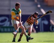 11 July 1999; Kevin Martin of Offaly in action against DJ Carey of Kilkenny during the Leinster Senior Hurling Championship Final match between Kilkenny and Offaly at Croke Park in Dublin. Photo by Ray McManus/Sportsfile