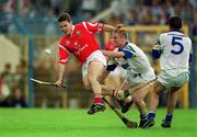 13 June 1999; Kevin Murray of Cork in action against Brian Flannery and Peter Queally, right, of Waterford during the Munster Senior Hurling Championship Semi-Final match between Cork and Waterford at Semple Stadium in Thurles, Tipperary. Photo by Ray McManus/Sportsfile