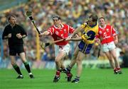 4 July 1999; Liam Doyle of Clare in action against Neil Ronan of Cork during the Munster Senior Hurling Championship Final match between Cork and Clare at Semple Stadium in Thurles, Tipperary. Photo by Brendan Moran/Sportsfile