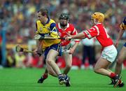 4 July 1999; Liam Doyle of Clare in action against Joe Deane of Cork during the Munster Senior Hurling Championship Final match between Cork and Clare at Semple Stadium in Thurles, Tipperary. Photo by Brendan Moran/Sportsfile