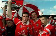 4 July 1999; Cork captain Mark Landers celebrates with the trophy following the Munster Senior Hurling Championship Final match between Cork and Clare at Semple Stadium in Thurles, Tipperary. Photo by Brendan Moran/Sportsfile
