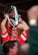 4 July 1999; Cork captain Mark Landers celebrates with the Munster Championship Trophy following the Munster Senior Hurling Championship Final match between Cork and Clare at Semple Stadium in Thurles, Tipperary. Photo by Damien Eagers/Sportsfile