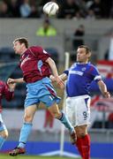 11 April 2006; James Keddy, Drogheda United, wins an aerial ball ahead of Glen Fergusion, Linfield. Setanta Cup Semi-Final, Linfield v Drogheda United, Windsor Park, Belfast. Picture credit: Oliver McVeigh / SPORTSFILE