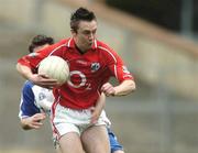 13 April 2006; Paul Kerrigan, Cork, in action against Shane Lannon, Waterford. Cadbury's Munster U21 Football Championship Final, Cork v Waterford, Pairc ui Rinn, Cork. Picture credit: Damien Eagers / SPORTSFILE