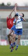 13 April 2006; Paul O'Flynn, Cork, contests a high ball with Mark Fives and Shane Lannon, foreground, Waterford. Cadbury's Munster U21 Football Championship Final, Cork v Waterford, Pairc ui Rinn, Cork. Picture credit: Damien Eagers / SPORTSFILE
