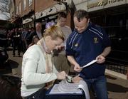 14 April 2006; Leinster supporter Graham Weir, from Bray, Co Wicklow, has his application checked by Leinster official Kiera Kennedy on the queue to purchase tickets for the Heineken Cup Semi-Final game against Munster on April 23rd. Lansdowne Road, Dublin. Picture credit: Ray McManus / SPORTSFILE