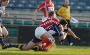 14 April 2006; Cameron Jowitt, Leinster, goes over for his try despite the tackle of Ceiron Thomas, Llanelli Scarlets. Celtic League 2005-2006, Group A, Leinster v Llanelli Scarlets, Lansdowne Road, Dublin. Picture credit: Matt Browne / SPORTSFILE