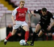 14 April 2006; Paul Keegan, St. Patrick's Athletic, in action against Jason McGuinness, Bohemians. eircom League, Premier Division, Bohemians v St. Patrick's Athletic, Dalymount Park, Dublin. Picture credit: David Maher / SPORTSFILE