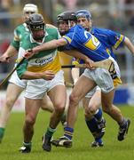 16 April 2006; Gary Hanniffy, Offaly, in action against Hugh Moloney, Tipperary. Allianz National Hurling League, Division 1 Quarter-Final, Tipperary v Offaly, Semple Stadium, Thurles, Co. Tipperary. Picture credit: Brian Lawless / SPORTSFILE