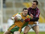16 April 2006; Barry Dunnion, Donegal, in action against Damien Healy, Westmeath. Allianz National Football League, Division 2 Semi-Final, Donegal v Westmeath, Kingspan Breffni Park, Cavan. Picture credit: Damien Eagers / SPORTSFILE