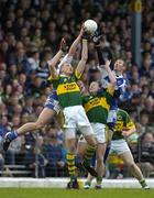 16 April 2006; Kieran Donaghy and Seamus Moynihan, Kerry, contest a dropping ball with Noel Garvan and Billy Sheehan, Laois. Allianz National Football League, Division 1 Semi-Final, Kerry v Laois, Fitzgerald Stadium, Killarney, Co. Kerry. Picture credit: Brendan Moran / SPORTSFILE