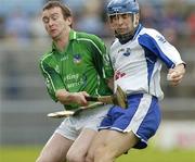 16 April 2006; Denis Coffey, Waterford, in action against Donie Ryan, Limerick. Allianz National Hurling League, Division 1 Quarter-Final, Waterford v Limerick, Semple Stadium, Thurles, Co. Tipperary. Picture credit: Brian Lawless / SPORTSFILE