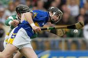 16 April 2006; Darragh Egan, Tipperary, in action against David Franks, Offaly. Allianz National Hurling League, Division 1 Quarter-Final, Tipperary v Offaly, Semple Stadium, Thurles, Co. Tipperary. Picture credit: Brian Lawless / SPORTSFILE