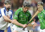 16 April 2006; Ollie Moran, Limerick, in action against Conor Carey, Waterford. Allianz National Hurling League, Division 1 Quarter-Final, Waterford v Limerick, Semple Stadium, Thurles, Co. Tipperary. Picture credit: Brian Lawless / SPORTSFILE