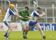 16 April 2006; Mark Keane, Limerick, in action against Eoin Murphy, left, and Tom Feeney, Waterford. Allianz National Hurling League, Division 1 Quarter-Final, Waterford v Limerick, Semple Stadium, Thurles, Co. Tipperary. Picture credit: Brian Lawless / SPORTSFILE