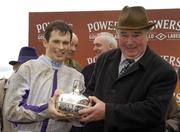 17 April 2006; Jockey Philip Carberry celebrates with trainer Pat Hughes after Point Barrow had won the Powers Whiskey Irish Grand National. Fairyhouse Racecourse, Co. Meath. Picture credit: Pat Murphy / SPORTSFILE