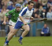 16 April 2006; Paul Flynn, Waterford, in action against Donal O'Grady, Limerick. Allianz National Hurling League, Division 1 Quarter-Final, Waterford v Limerick, Semple Stadium, Thurles, Co. Tipperary. Picture credit: David Levingstone / SPORTSFILE