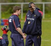 19 April 2006; Jim Williams speaks with Ronan O'Gara during Munster squad training. Thomond Park, Limerick. Picture credit; Pat Murphy / SPORTSFILE