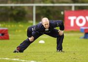19 April 2006; Peter Stringer stretches during Munster squad training. Thomond Park, Limerick. Picture credit; Pat Murphy / SPORTSFILE