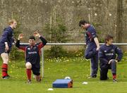 19 April 2006; Munster's, from left, Paul O'Connell, Denis Leamy, Anthony Foley and Donnacha O'Callaghan stretch during squad training. Thomond Park, Limerick. Picture credit; Pat Murphy / SPORTSFILE