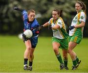 24 May 2014; Aisling Barrett, Munster, in action against Tracey Lawlor and Noelle Healy, right, Leinster. 2014 MMI Group Ladies Football Interprovincial Tournament Shield Final, Leinster v Munster, Kinnegad, Co. Westmeath. Picture credit: Pat Murphy / SPORTSFILE