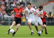 24 May 2014; Aidan Carr, Down, in action against Emmett McKenna, Tyrone. Ulster GAA Football Senior Championship, Preliminary Round Replay, Down v Tyrone, Pairc Esler, Newry, Co. Down. Picture credit: Oliver McVeigh / SPORTSFILE