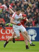 24 May 2014; Sean Cavanagh, Tyrone, in action against Mark Poland, Down. Ulster GAA Football Senior Championship, Preliminary Round Replay, Down v Tyrone, Pairc Esler, Newry, Co. Down. Picture credit: Oliver McVeigh / SPORTSFILE