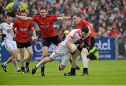 24 May 2014; Sean Cavanagh, Tyrone, in action against Declan Rooney and Brendan McArdle ,Down. Ulster GAA Football Senior Championship, Preliminary Round Replay, Down v Tyrone, Pairc Esler, Newry, Co. Down. Picture credit: Oliver McVeigh / SPORTSFILE
