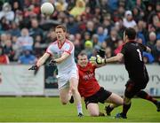 24 May 2014; Niall McKenna, Tyrone, in action against Daniel McCartan and Brendan McVeigh,Down. Ulster GAA Football Senior Championship, Preliminary Round Replay, Down v Tyrone, Pairc Esler, Newry, Co. Down. Picture credit: Oliver McVeigh / SPORTSFILE