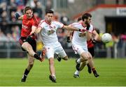 24 May 2014; Ronan McNamee, Tyrone, in action against Ryan Johnston, Down. Ulster GAA Football Senior Championship, Preliminary Round Replay, Down v Tyrone, Pairc Esler, Newry, Co. Down. Picture credit: Oliver McVeigh / SPORTSFILE