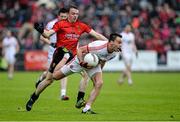 24 May 2014; Kyle Coney, Tyrone, in action against Brendan McArdle, Down. Ulster GAA Football Senior Championship, Preliminary Round Replay, Down v Tyrone, Pairc Esler, Newry, Co. Down. Picture credit: Oliver McVeigh / SPORTSFILE