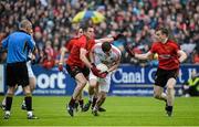 24 May 2014; Sean Cavanagh, Tyrone, in action against Declan Rooney and Brendan McArdle, Down. Ulster GAA Football Senior Championship, Preliminary Round Replay, Down v Tyrone, Pairc Esler, Newry, Co. Down. Picture credit: Oliver McVeigh / SPORTSFILE