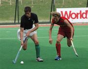 15 April 2006;  Ireland's John Jermyn, Cork Church of Ireland, on the attack against Belgium in the third pool match. Belgium won the match 1-0. Ireland now need to beat Egypt on Monday in their next pool match to keep their qualifying hopes alive. BDO Men's Hockey World Cup Qualifier, Pool A, Ireland v Belgium, Changzhou, China.    Issued by SPORTSFILE on behalf of the Irish Sports Council