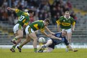 9 April 2006; Coman Goggins, Dublin, in action against Paul Galvin, left, Eamonn Fitzmaurice and Seamus Moynihan, right, Kerry. Allianz National Football League, Division 1A, Round 7, Kerry v Dublin, Fitzgerald Stadium, Killarney, Co. Kerry. Picture credit: Brendan Moran / SPORTSFILE