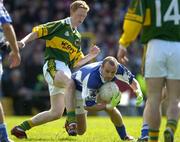 16 April 2006; Tom Kelly, Laois, in action against Colm Cooper, Kerry. Allianz National Football League, Division 1 Semi-Final, Kerry v Laois, Fitzgerald Stadium, Killarney, Co. Kerry. Picture credit: Brendan Moran / SPORTSFILE