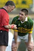 16 April 2006; Darragh O Se, Kerry, listens to referee Pat McEnaney before being shown a yellow card. Allianz National Football League, Division 1 Semi-Final, Kerry v Laois, Fitzgerald Stadium, Killarney, Co. Kerry. Picture credit: Brendan Moran / SPORTSFILE
