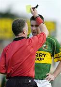 16 April 2006; Darragh O Se, Kerry, is shown a yellow card by referee Pat McEnaney. Allianz National Football League, Division 1 Semi-Final, Kerry v Laois, Fitzgerald Stadium, Killarney, Co. Kerry. Picture credit: Brendan Moran / SPORTSFILE