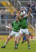16 April 2006; Mike O'Brien, Limerick, in action against Michael Walsh, Waterford. Allianz National Hurling League, Division 1 Quarter-Final, Waterford v Limerick, Semple Stadium, Thurles, Co. Tipperary. Picture credit: Brian Lawless / SPORTSFILE