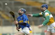 16 April 2006; Eoin Kelly, Tipperary, in action against David Franks, Offaly. Allianz National Hurling League, Division 1 Quarter-Final, Tipperary v Offaly, Semple Stadium, Thurles, Co. Tipperary. Picture credit: David Levingstone / SPORTSFILE