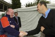 22 April 2006; Munster coach Declan Kidney and Leinster coach Michael Ckeika shake hands before the start of the press conference ahead of the Heineken Cup Semi-Final game between Leinster and Munster. Lansdowne Road, Dublin. Picture credit: Matt Browne / SPORTSFILE