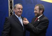 22 April 2006; The outgoing GAA President Sean Kelly pins the presidental badge on to the lapel of the incoming President Nickey Brennan at the 2006 GAA Annual Congress. Great Southern Hotel, Killarney, Co. Kerry. Picture credit: Ray McManus / SPORTSFILE