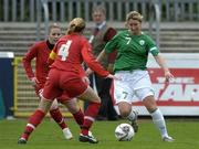 22 April 2006; Ciara Grant, Republic of Ireland, in action against Prisca Steinegger (4) and Daniela Kuenzler, Switzerland.  World Cup Qualifier, Republic of Ireland v Switzerland, Richmond Park, Dublin. Picture credit: Ray Lohan / SPORTSFILE