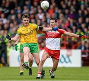 25 May 2014; Leo McLoone, Donegal, in action against Kevin Johnston, Derry. Ulster GAA Football Senior Championship Quarter-Final, Derry v Donegal, Celtic Park, Derry. Picture credit: Oliver McVeigh / SPORTSFILE