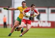25 May 2014; Gareth McKInless, Derry, in action against Michael Murphy, Donegal. Ulster GAA Football Senior Championship Quarter-Final, Derry v Donegal, Celtic Park, Derry. Picture credit: Pat Murphy / SPORTSFILE
