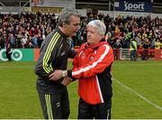 25 May 2014; Donegal manager Jim McGuinness, left, and Derry manager Brian McIver shake hands after the game. Ulster GAA Football Senior Championship Quarter-Final, Derry v Donegal, Celtic Park, Derry. Picture credit: Pat Murphy / SPORTSFILE