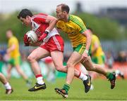 25 May 2014; Dermot McBride, Derry, in action against Colm McFadden, Donegal. Ulster GAA Football Senior Championship Quarter-Final, Derry v Donegal, Celtic Park, Derry. Picture credit: Pat Murphy / SPORTSFILE