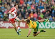 25 May 2014; Ryan Devlin, Derry, in action against Eamonn McGee, Donegal. Ulster GAA Football Senior Championship Quarter-Final, Derry v Donegal, Celtic Park, Derry. Picture credit: Oliver McVeigh / SPORTSFILE