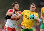 25 May 2014; Eamonn McGee, Donegal, in action against Emmett McGuckin, Derry. Ulster GAA Football Senior Championship Quarter-Final, Derry v Donegal, Celtic Park, Derry. Picture credit: Oliver McVeigh / SPORTSFILE